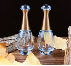 Sunshine personalizirana luksuzna visokokvalitetna zlatna prozirna veleprodajna prazna kozmetička ambalaža staklena bočica za parfeme od 30 ml